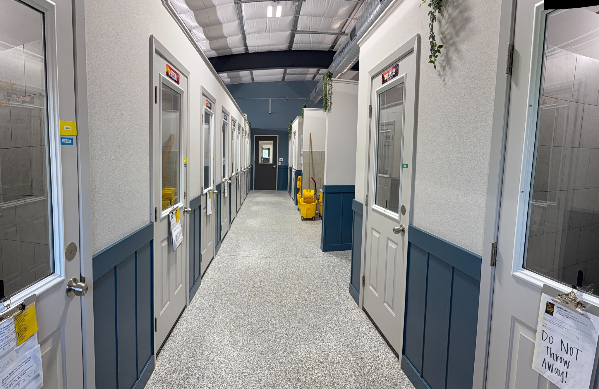 Clean hallway of private dog lodging suites